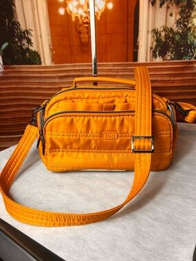 Lug Trolley convertible crossbody Gold Quilted Bag Multiple zippered compartment